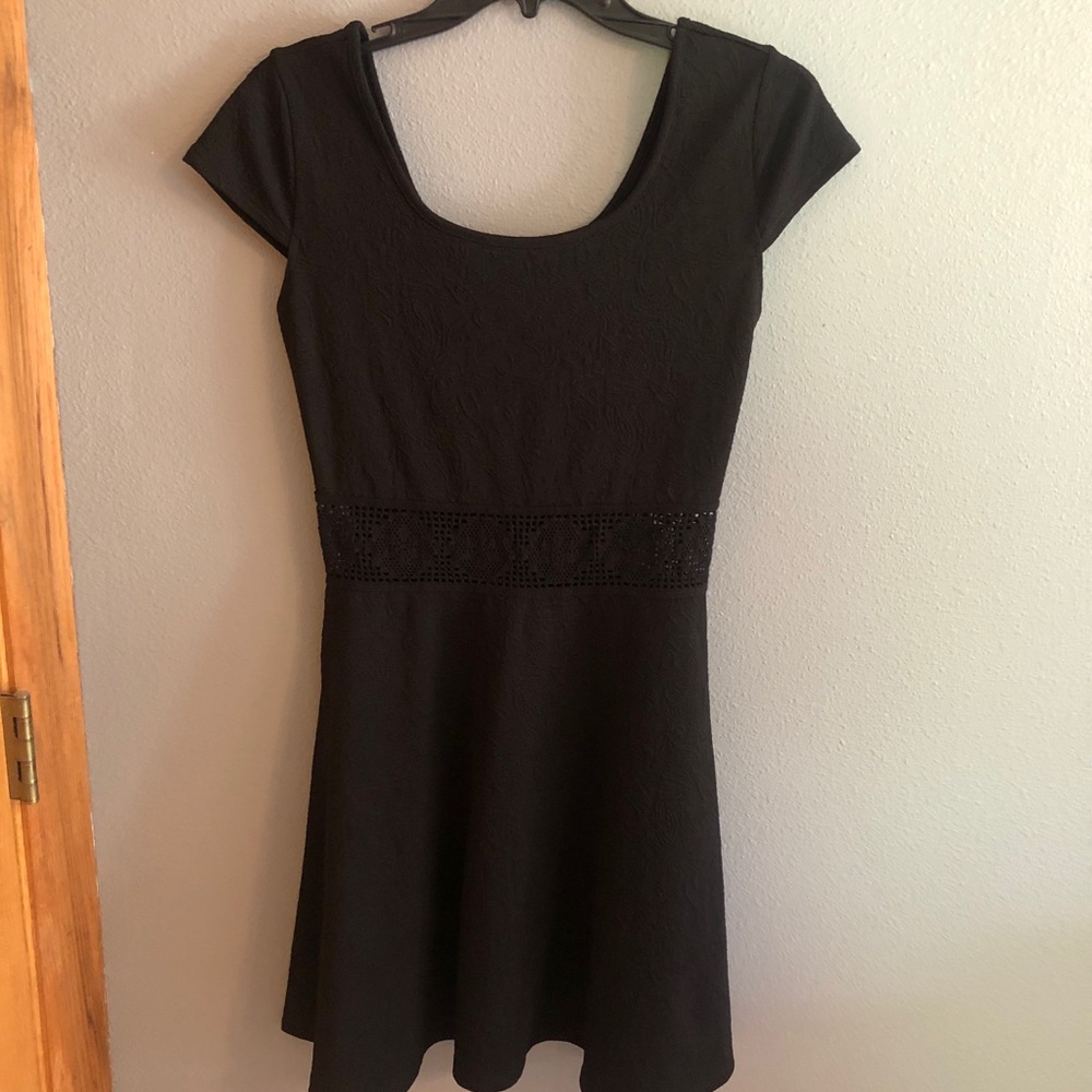 Black dress with lace cut out belt